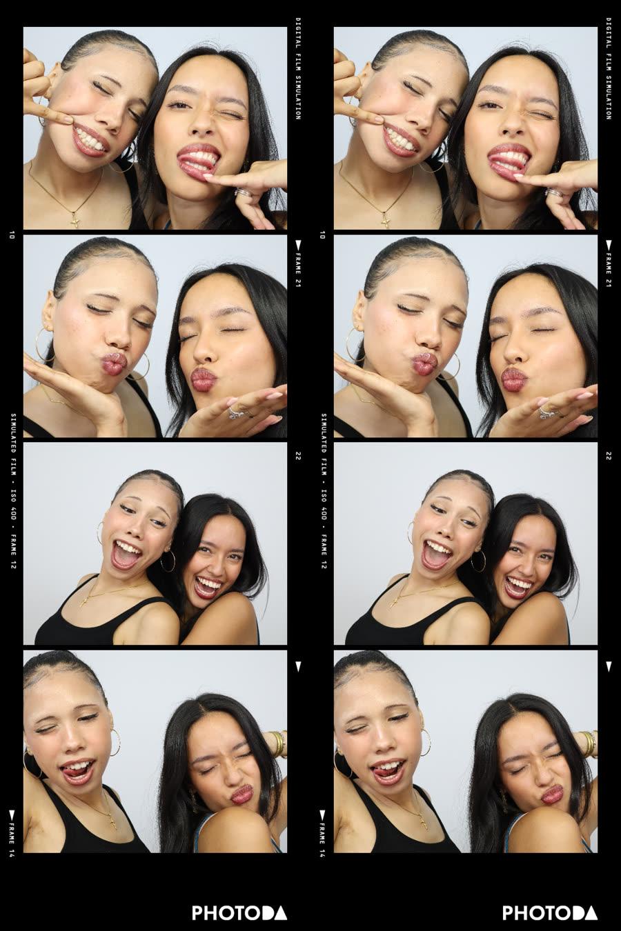 A real PhotoDA photo strip of two friends in the Classic Room on a black frame